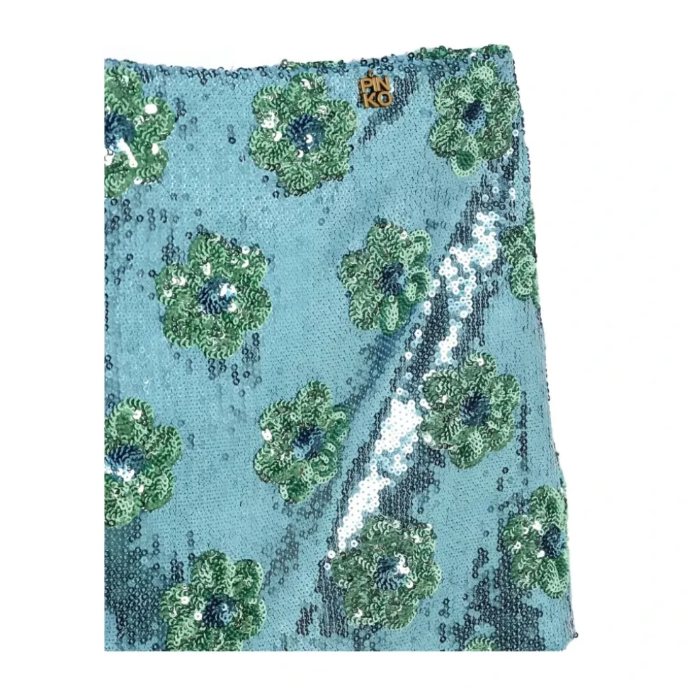 Gonna con paillettes e logo applicato