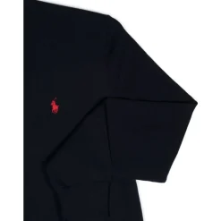 Niebieski sweter z haftem