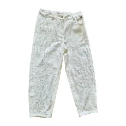 Spodnie bawełniane z efektem denimu distressed z cekinami