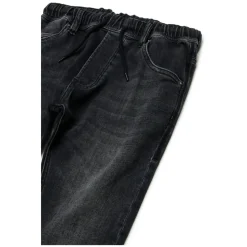 Spodnie JoggJeans o zwężanym kroju z czarnym gradientem - Krooley