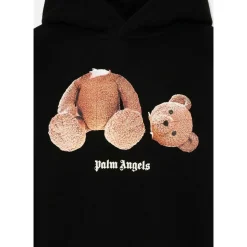 Sweter z motywem misia
