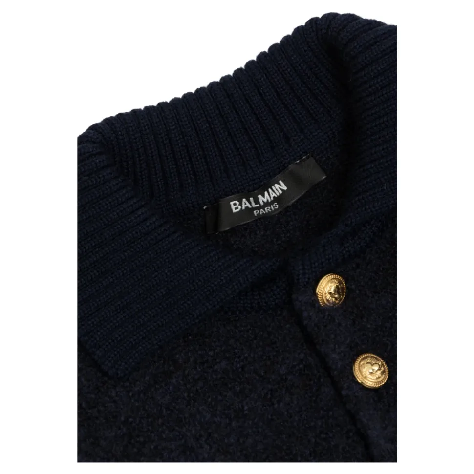 Sweter z naszywką